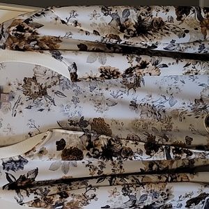 Nylon/spandex jacket cream colored with dark brown and gray and cream on the jac